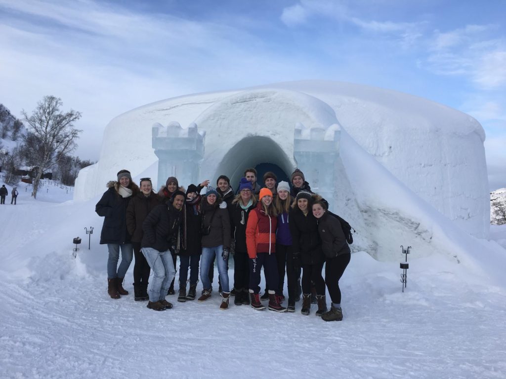 Group outside snow cave